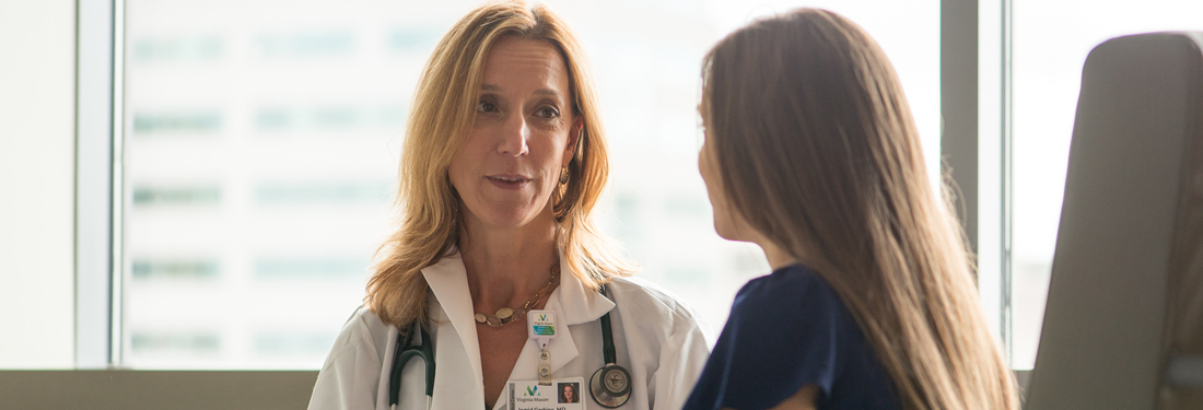 Doctor talking to woman | Virginia Mason Institute