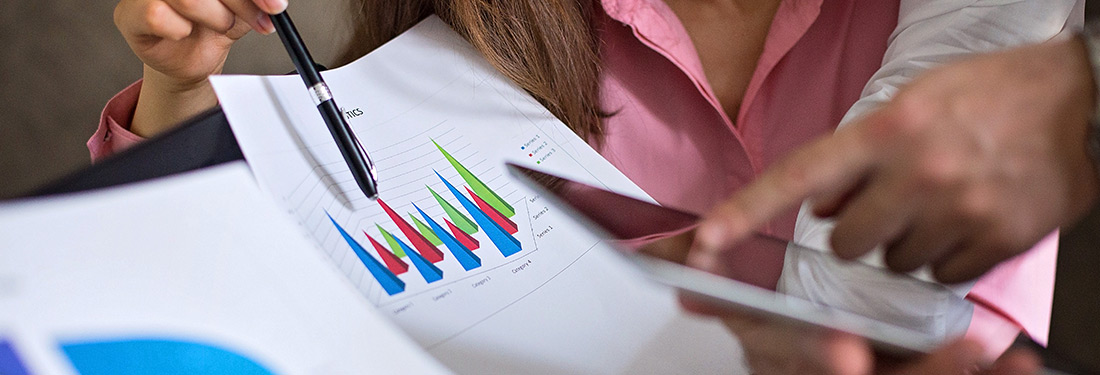 Woman Holding Printed Graph | Virginia Mason Institute